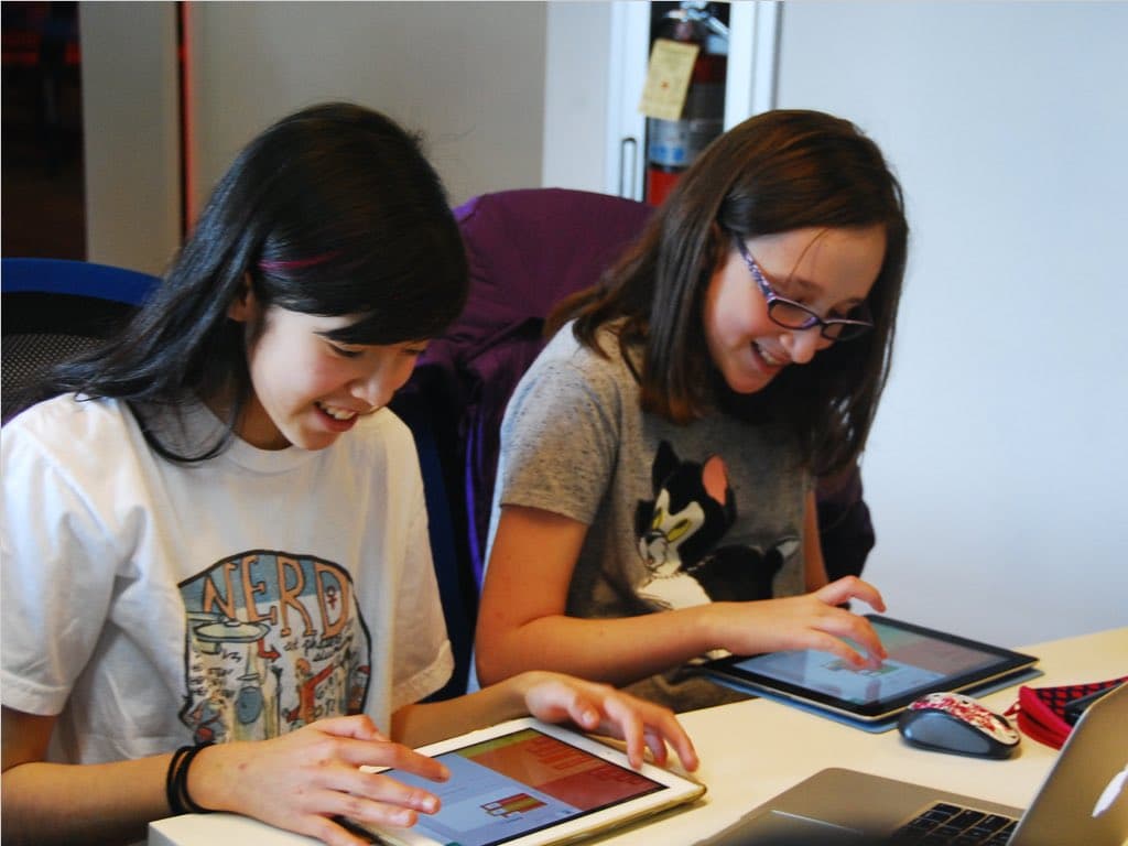 Girls using hopscotch